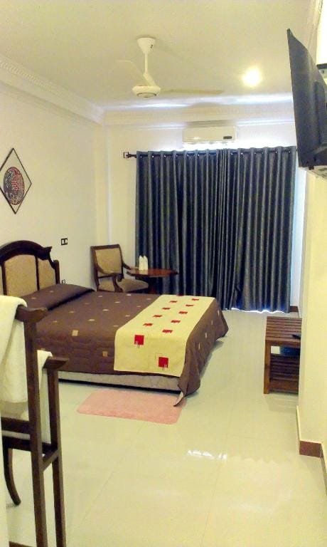 Standard Triple Room with Balcony